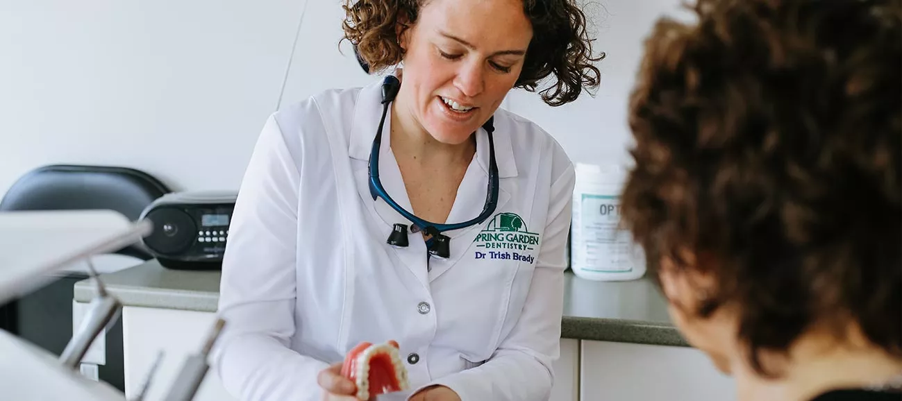 Dr. Trish Brady explaining to a patient